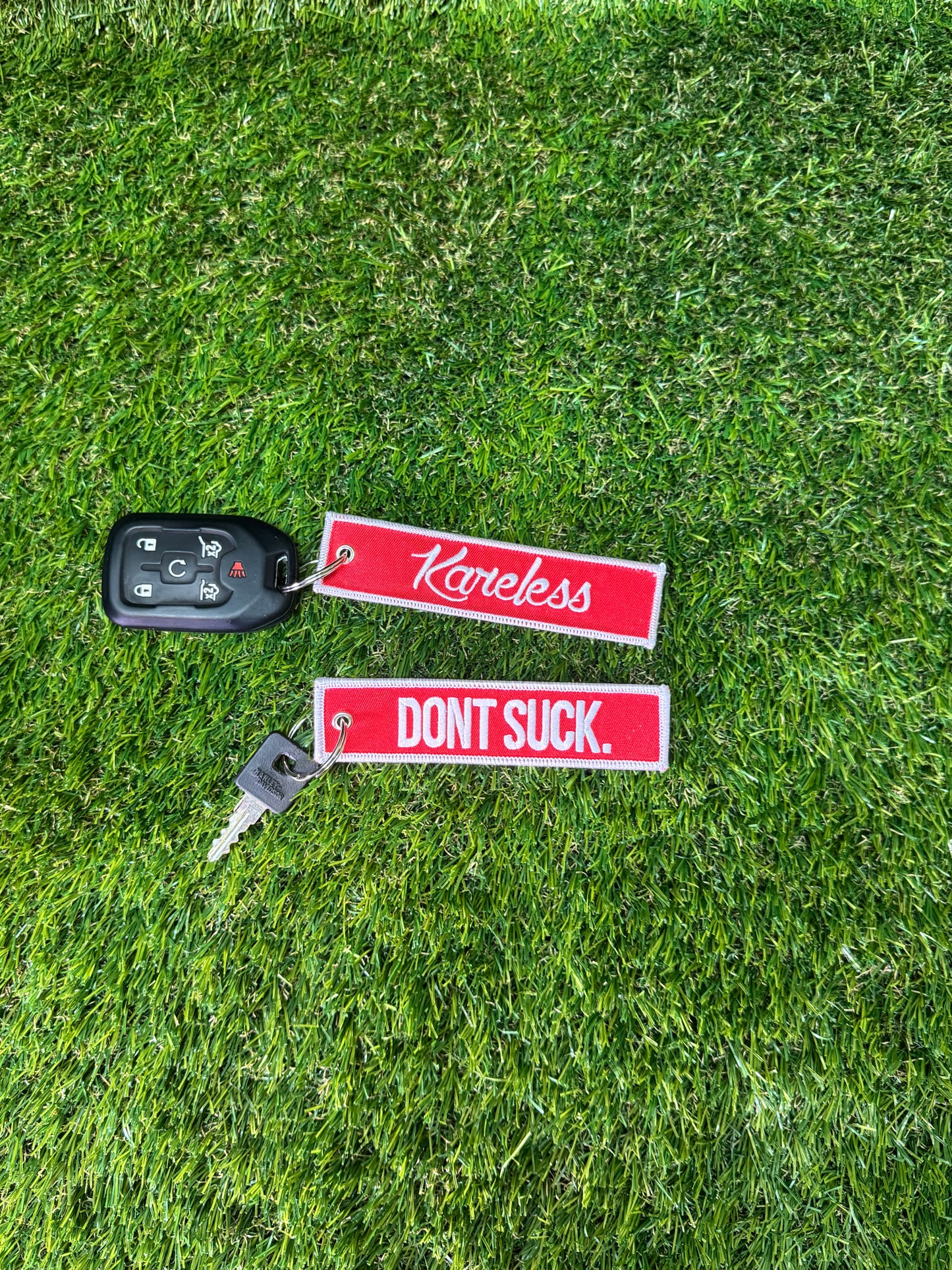 "DONT SUCK." Red 'n White Key Tag - Double Sided