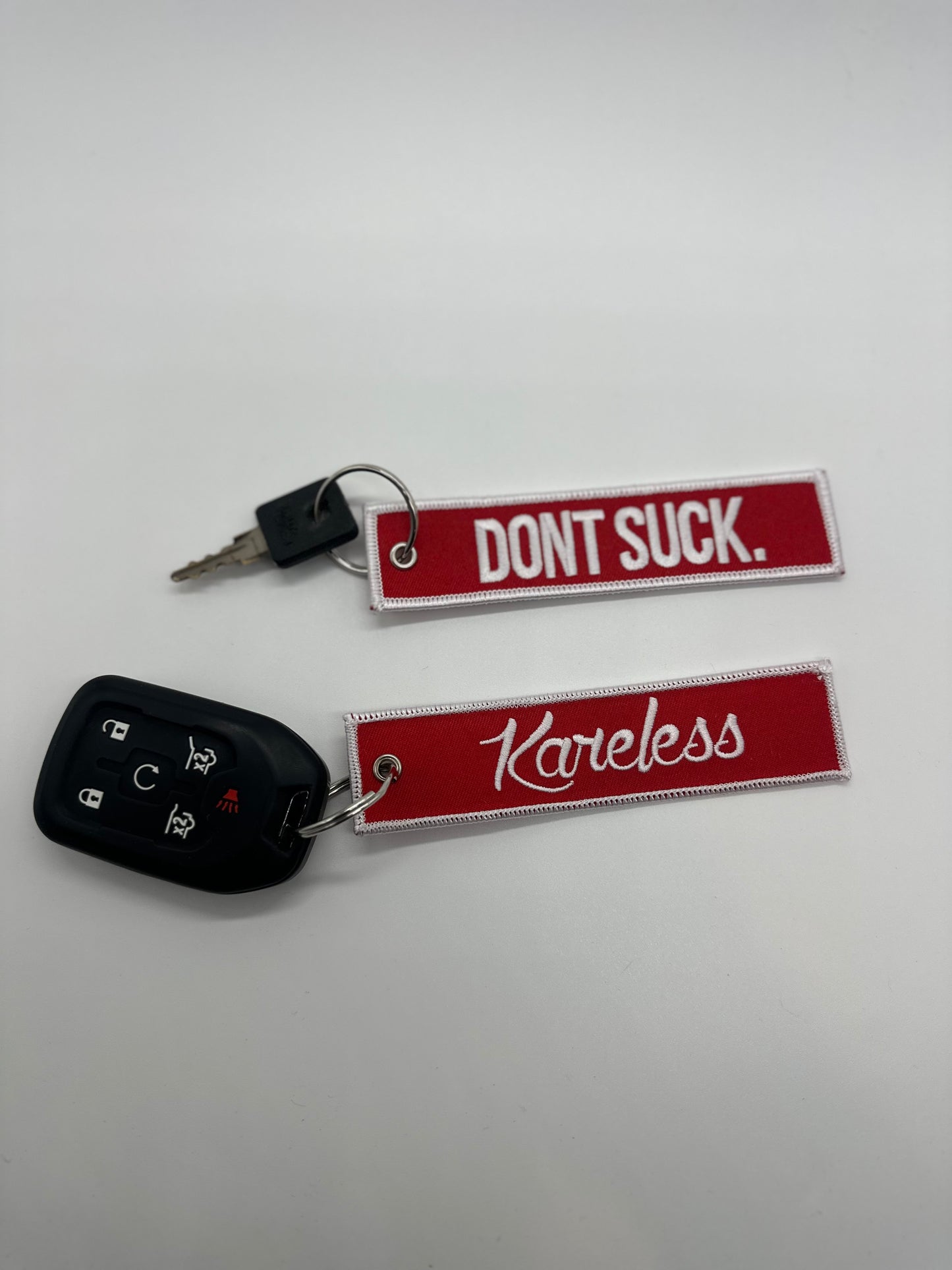 "DONT SUCK." Red 'n White Key Tag - Double Sided